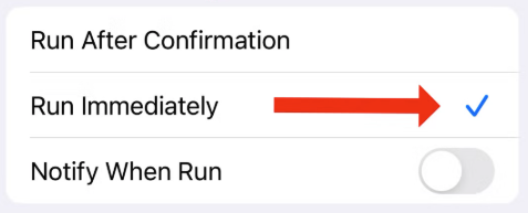 Two options on screen. The first one says 'Run after confirmation'. The second one has a red arrow pointing to a blue checked mark for the selection that says'Run immediately'