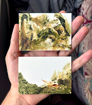 Snail-defecation trading card in sleeve