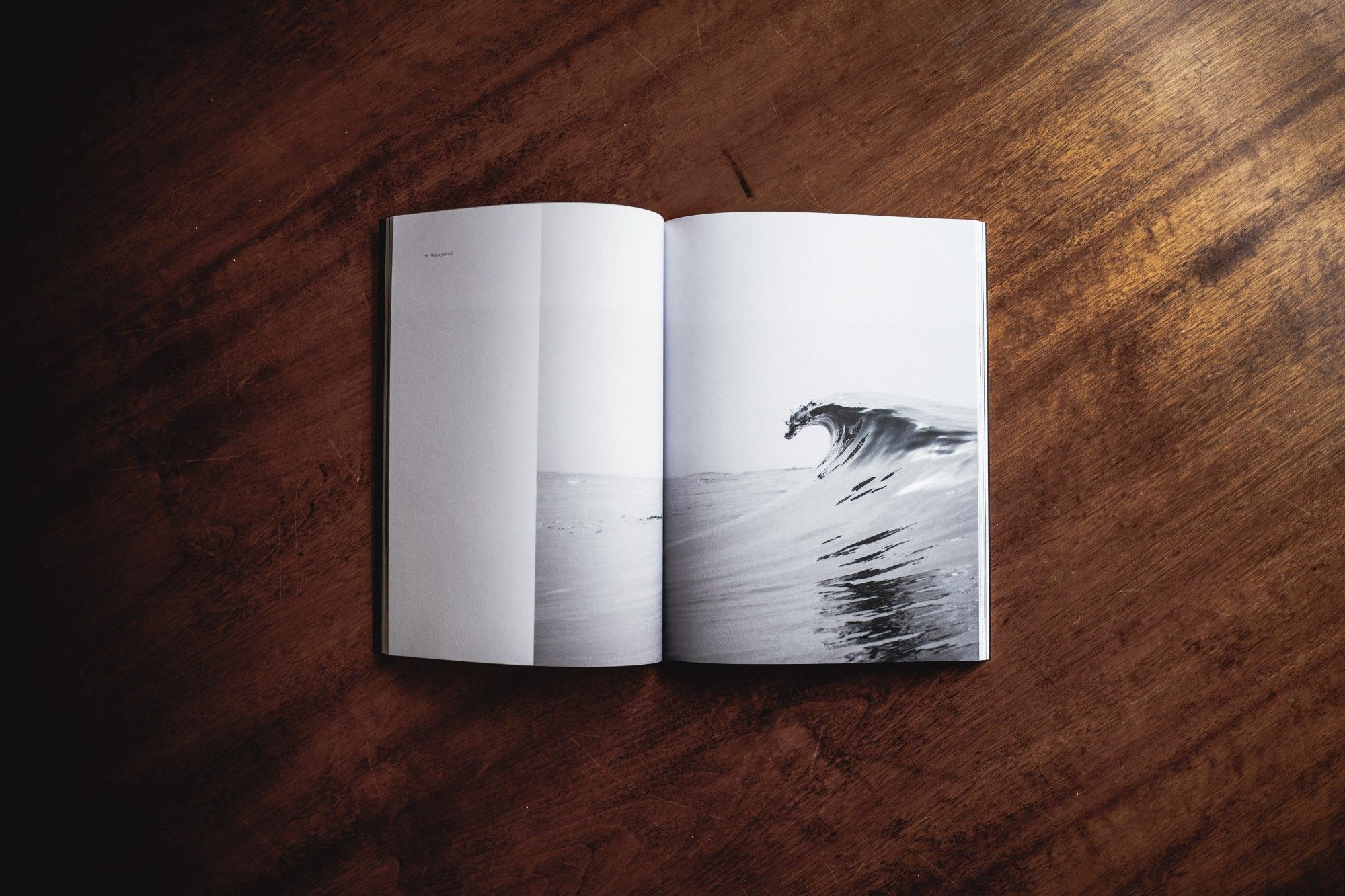 A book with a photo of a wave