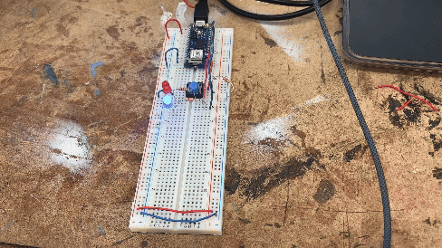 breadboard with LED changing from red to blue