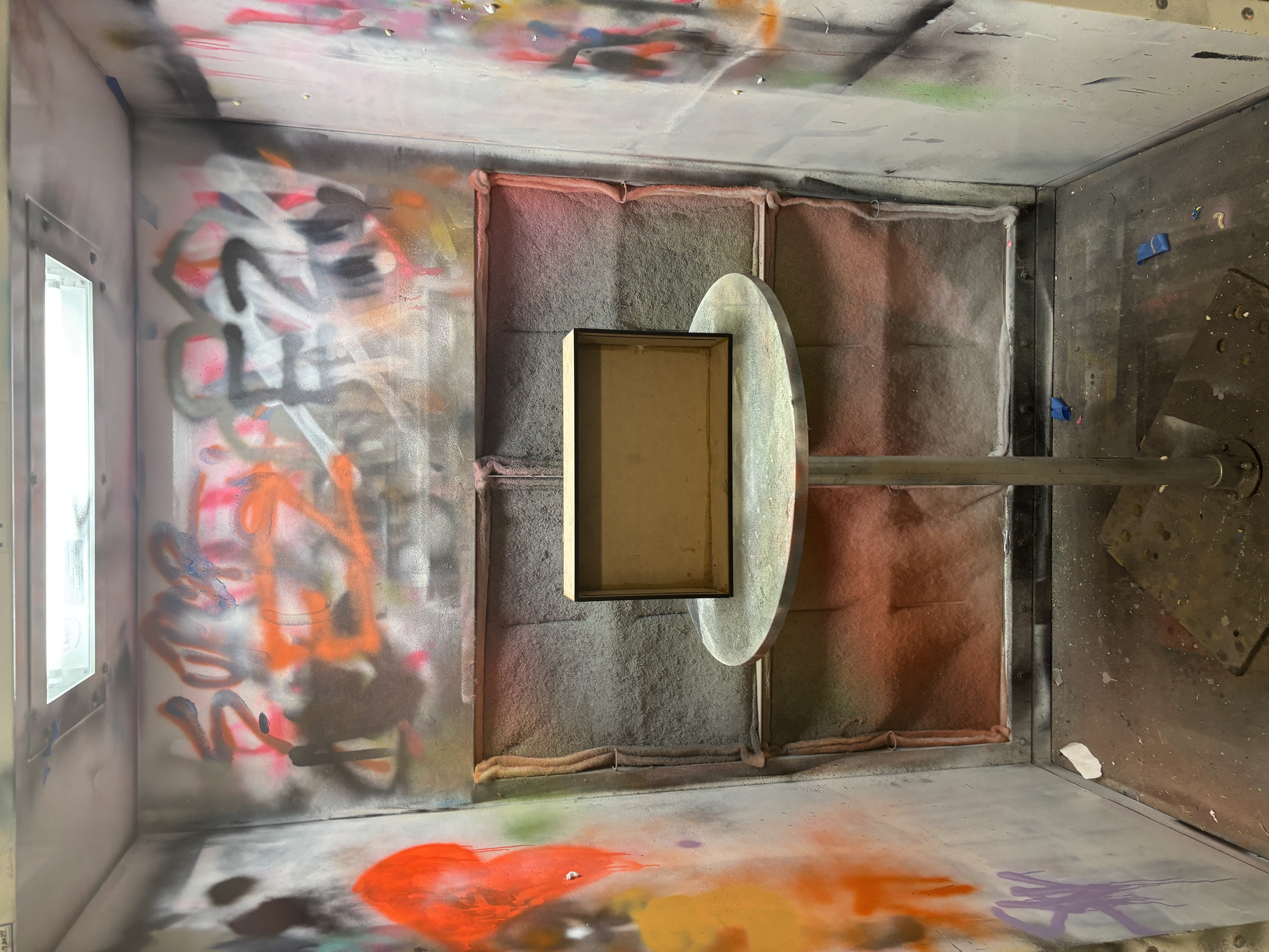 In the spray paint booth