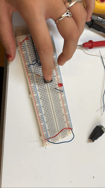 arduino circuit with LED and button turning it off and on